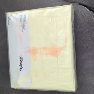 Light yellow twin sheets. .